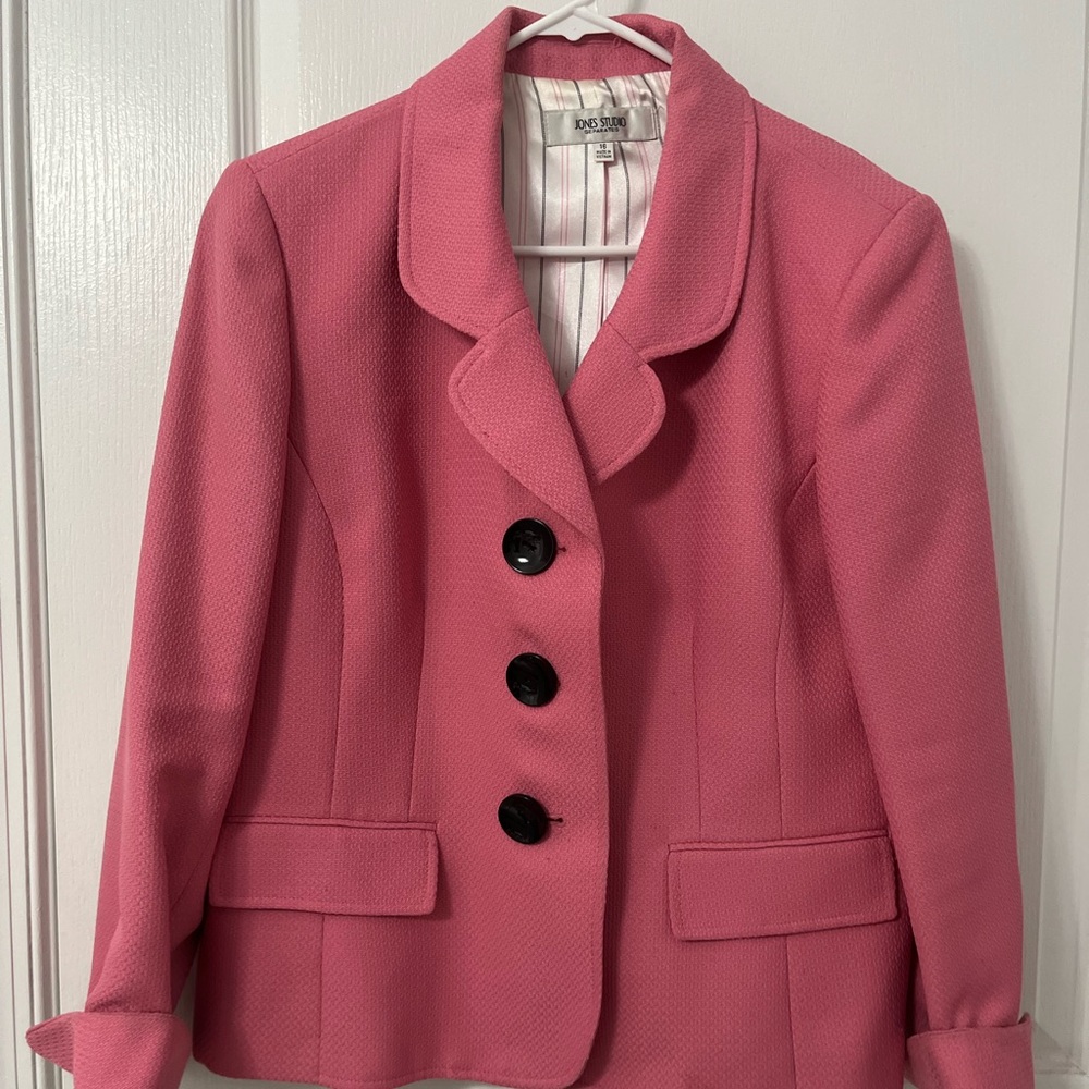 Pink blazer with big black buttons